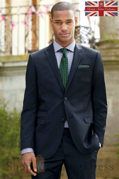 navy blue suit green tie.